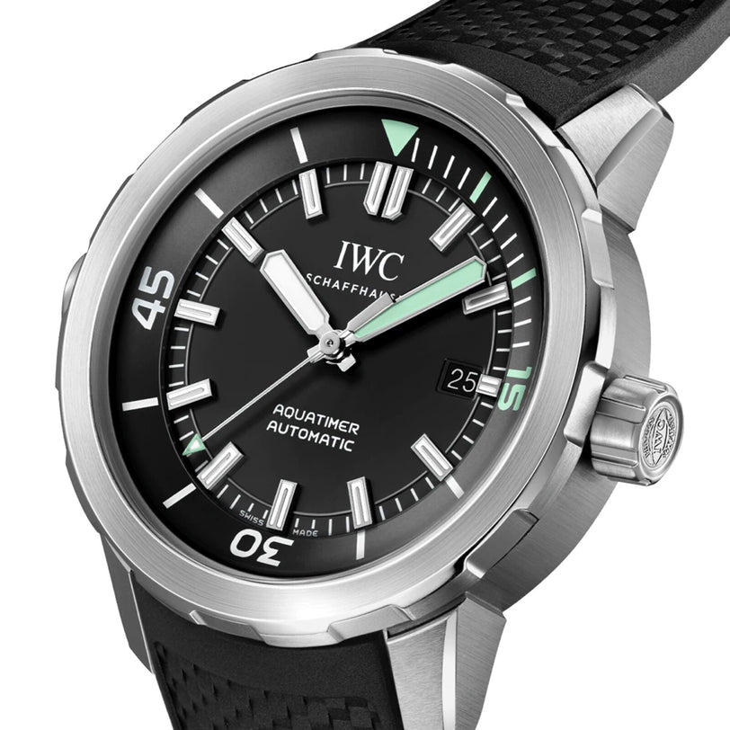 The IWC Schaffhausen Aquatimer Automatic features a stainless steel case, luminescent dial with date display, luminous hands and markers, a rotatable bezel, and a black textured strap.