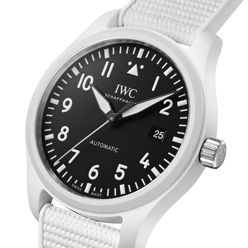 Close-up of the IWC Schaffhausen Pilots Watch Automatic 41 Top Gun Lake Tahoe, showing a black dial with white numerals, date at 3 o’clock, and a white fabric strap.