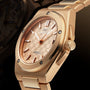 Close up viw of IWC Schaffhausen’s Ingenieur Automatic 35 gold wristwatch from the side