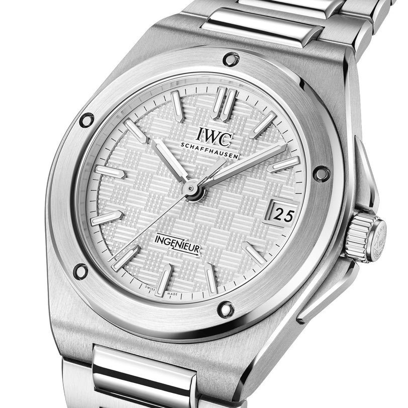 The IWC Schaffhausen Ingenieur Automatic 35 is a silver wristwatch featuring a textured dial and a date display positioned at 3 o’clock.