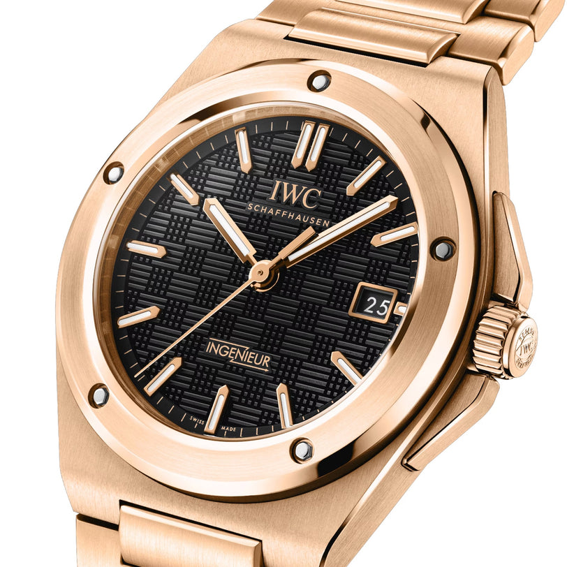 The IWC Schaffhausen Ingenieur Automatic 40 is a luxury watch with an 18-carat gold case, black textured dial, gold hour markers and hands, plus a date display at 3 o’clock.