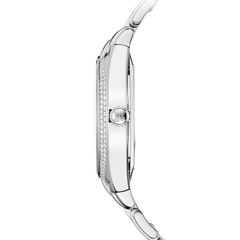 Side view of the Patek Philippe Twenty~4 7300/1200A-001, a slim silver wristwatch featuring diamond accents and a metallic band.
