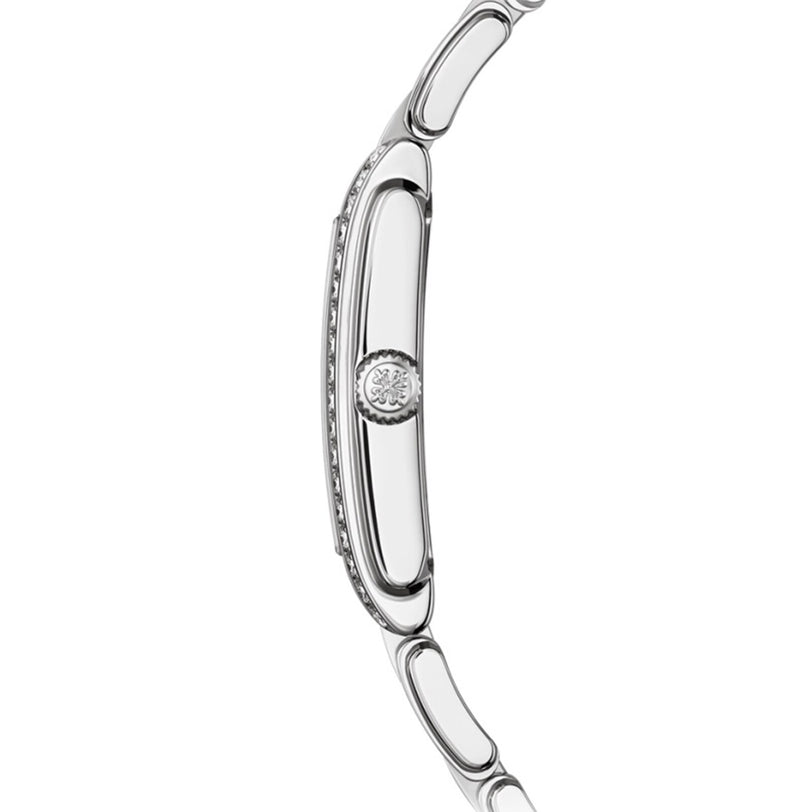 Side view of the Patek Philippe Twenty~4 4910/1200A-001, a slim silver wristwatch with a round crown and linked metal bracelet.