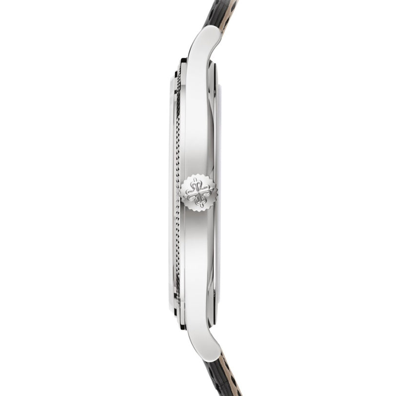 Side view of the Patek Philippe Calatrava 6119G-001, featuring a slim silver case and patterned leather strap.