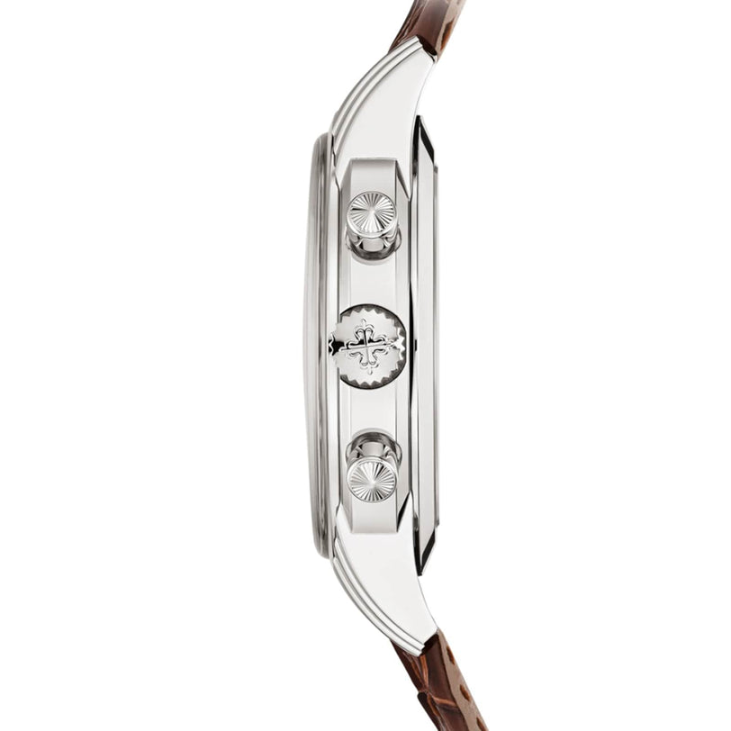 Side view of the Patek Philippe Complication 5172G-010, showcasing its silver case, brown leather strap, and distinctive crown and pushers.