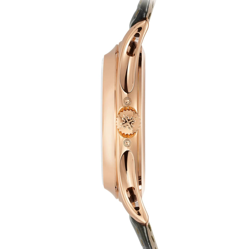 Side view of the Patek Philippe Complication 5205R-011 wristwatch in rose gold, featuring a crown and a dark leather strap.
