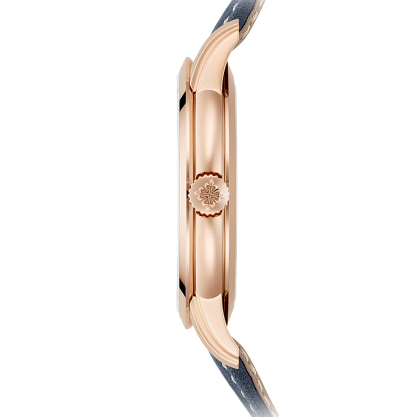 Side view of the Patek Philippe Complications 5224R-001, a rose gold wristwatch with a dark strap and a floral emblem on the crown.