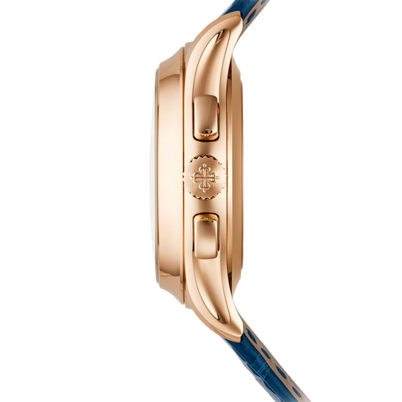 Side view of the Patek Philippe Complications 5905R-010 gold wristwatch with blue strap, featuring visible crown and pushers on the case.