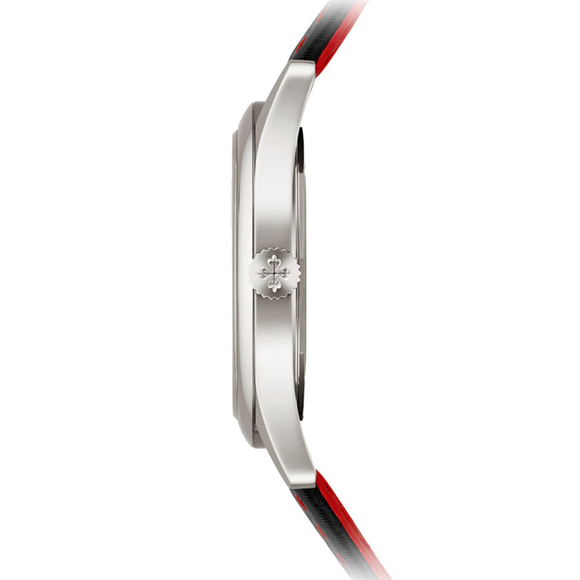 Side view of the Patek Philippe Calatrava 6007G-010, a silver wristwatch with a red and black strap, highlighting the crown adorned with an engraved emblem.