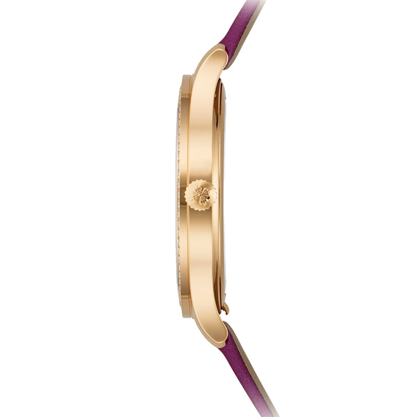 Side view of the Patek Philippe Calatrava 4997/200R-001, featuring a gold case, purple leather strap, and crown.