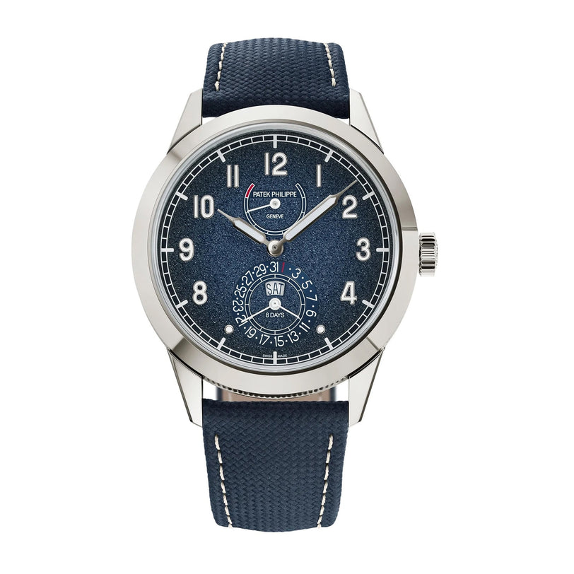 The Patek Philippe Complications 5328G-001 is a luxury blue wristwatch with a textured dial and date and day display.