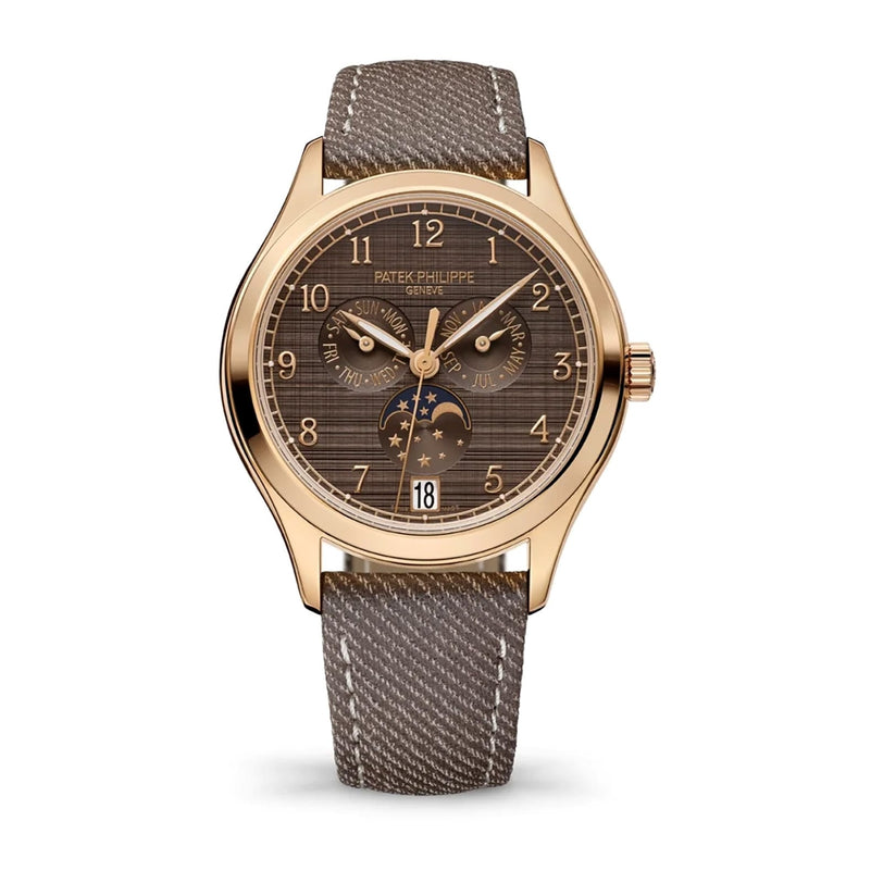 Patek Philippe Complications 4946R-001 watch in gold with a brown textured dial, moon phase display, and taupe fabric strap.