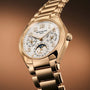 Patek Philippe Twenty~4 7340/1R-001 gold wristwatch featuring a white dial, multiple subdials, and a moon phase display.