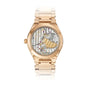 The Patek Philippe Twenty~4 7340/1R-001 wristwatch in rose gold features a transparent case back that reveals its intricate mechanical movement and gears.