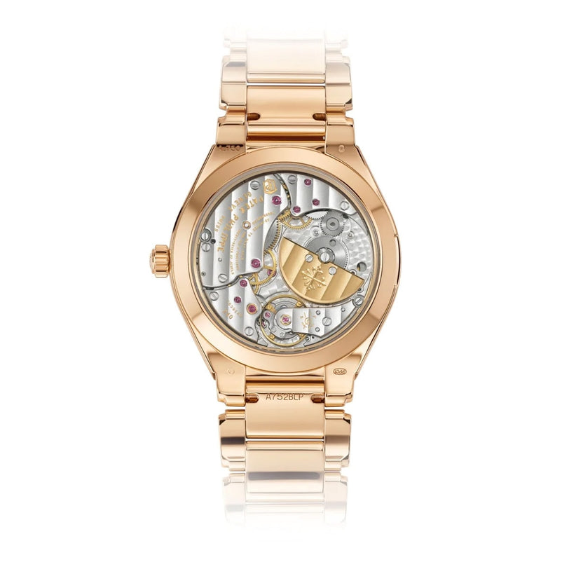 Back view of the Patek Philippe Twenty~4 7340/1R-010, showcasing its intricate mechanical movement and gears through a transparent case.