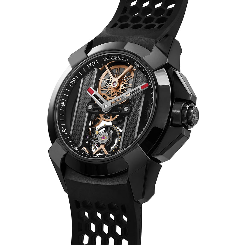 The Jacob & Co Epic X DLC is a luxury skeleton watch featuring a black case, black strap, and exposed gears.