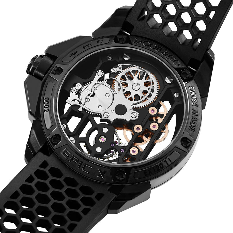 The Jacob & Co Epic X DLC is a black skeleton watch featuring visible gears and a black rubber strap with a honeycomb pattern.