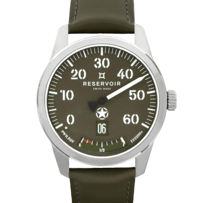 The Reservoir Battlefield D-Day wristwatch features an olive green dial inspired by Operation Overlord, white numerals, a power reserve indicator, date window at 6 o’clock, and a black leather strap—echoing WWII all-terrain vehicles.