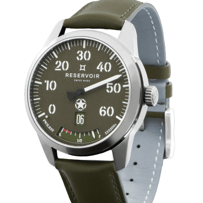The Reservoir Battlefield D-Day is a stainless steel wristwatch with an olive green face and strap, bold white numerals, and RESERVOIR branding—evoking the rugged spirit of WWII D-Day all-terrain vehicles.