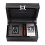 The Reservoir GT Tour box set includes a GT Tour watch, an extra strap, and a booklet, all neatly arranged in a black case.