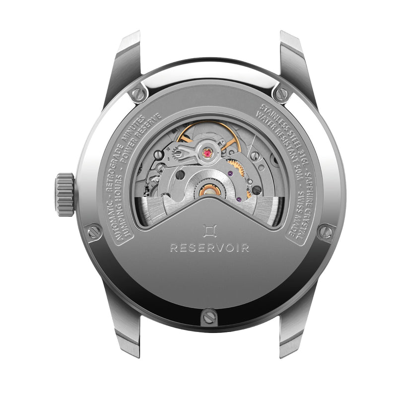 Back view of the Reservoir Tiefenmesser wristwatch, inspired by submarine equipment, highlighting its automatic mechanical movement and engraved metal case details.