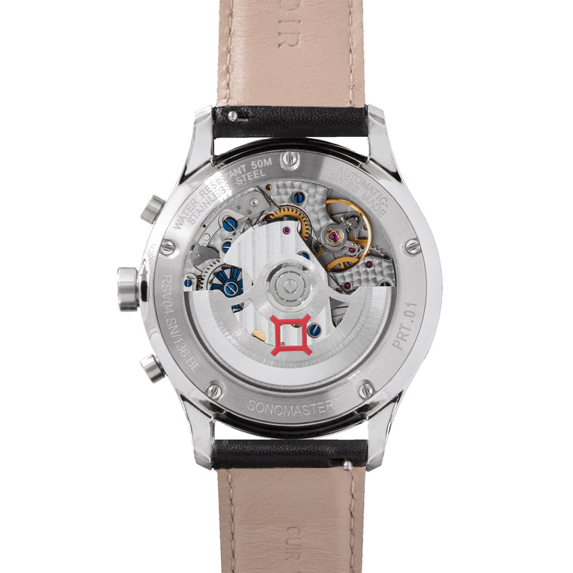 Back view of the Reservoir Sonomaster Chronograph Vintage, displaying its exposed mechanical movement and gears, paired with a beige leather strap.