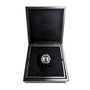 The Sonomaster Chronograph Vintage by Reservoir is showcased in an open black Reservoir box with a soft, velvet interior.