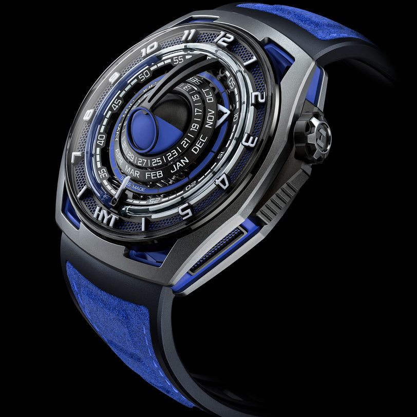 The HYT Moon Runner Supernova Blue is a futuristic wristwatch with concentric dials and a bold, modern design, showcased on a black background.