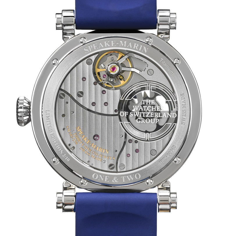 Back view of the Speake Marin Dual Time Watches of Switzerland Group Edition Blue, showcasing its visible mechanical movement and ‘Speake-Marin’ engraved on the metal case.