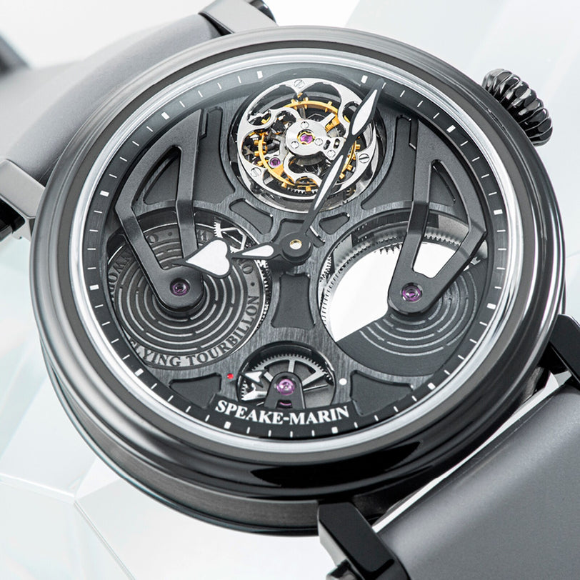 Close-up of the Speake Marin Openworked Tourbillon Black DLC, a luxury skeleton watch with visible gears and a black dial.