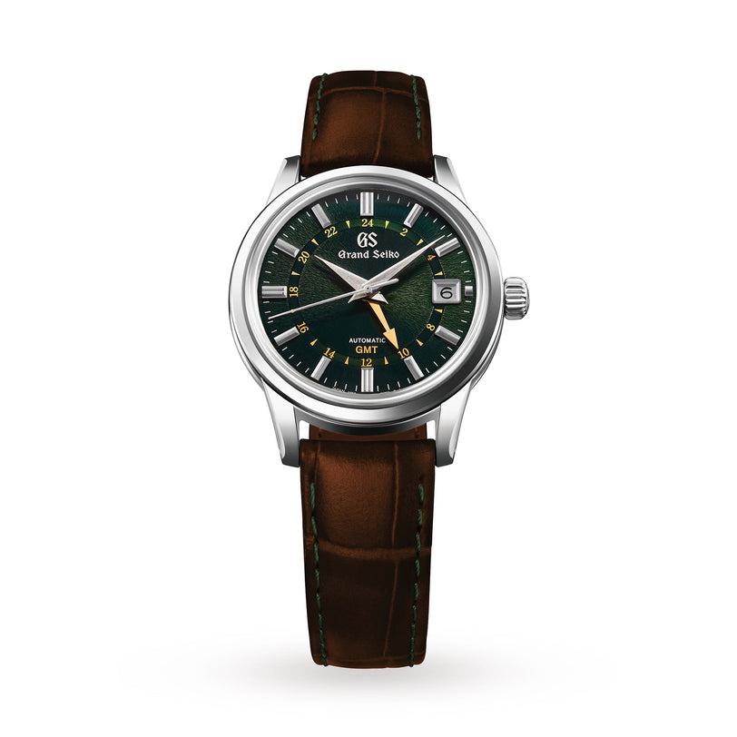 The Grand Seiko Automatic GMT Elegance features a Mount Iwate green dial, date at 3 o’clock, silver case, and brown leather strap, shown against a white background.