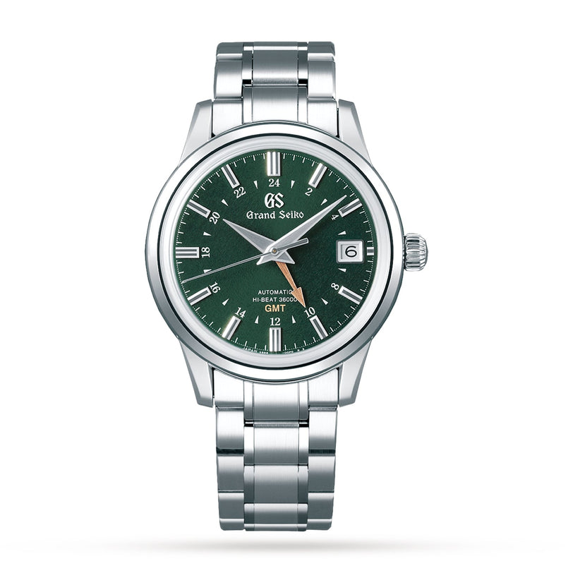The Grand Seiko Hi-Beat GMT Elegance wristwatch features a green spring equinox-inspired dial, silver hour markers, date at 3 oclock, Calibre 9S86 movement, and metal link bracelet, shown against a white background.