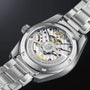 Close-up of the back of a Grand Seiko Hi-Beat Heritage stainless steel watch, revealing its precise mechanical movement and engraved caseback details.