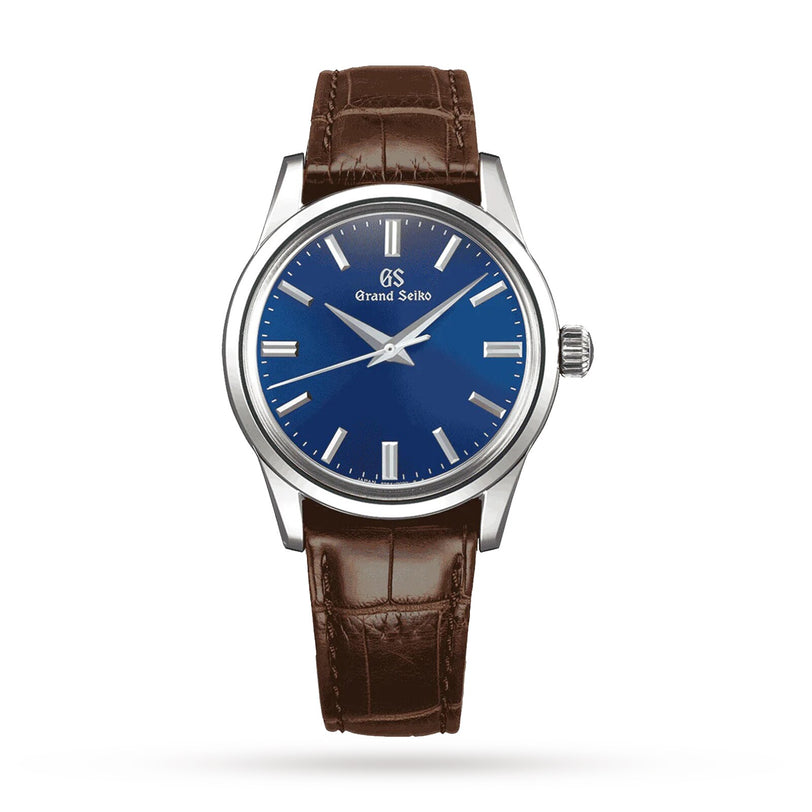 The Grand Seiko Manual Elegance features a blue dial inspired by the Oruri songbird, silver hour markers and hands, a stainless steel case, and a brown leather strap—model SBGW279.