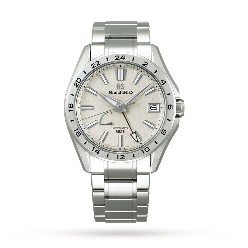 The Grand Seiko Spring Drive GMT Evolution 9 features a stainless steel case and bracelet, textured light dial, date at 4 o’clock, GMT hand, and a 24-hour bezel in the signature Grand Seiko style.