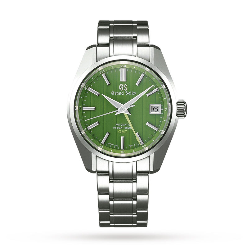 The Grand Seiko Hi-Beat GMT Heritage features a green dial inspired by bamboo, silver hour markers, date window at 3 o’clock, and a stainless steel bracelet.