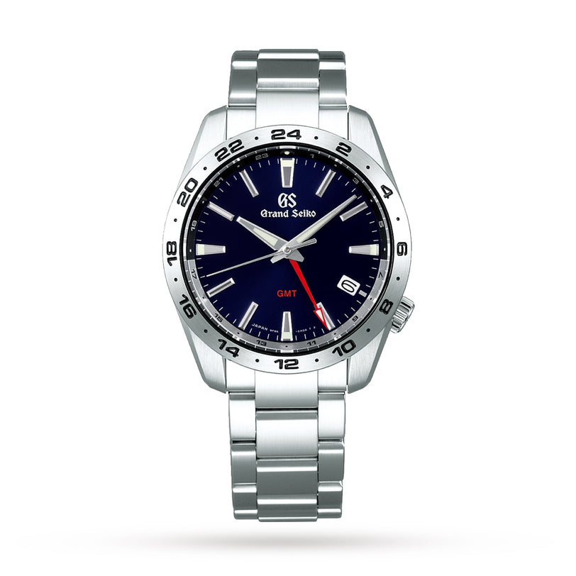 The Grand Seiko Quartz GMT Sport is a stainless steel wristwatch with a blue dial, red GMT hand, date at 3 oclock, and Zaratsu-polished case for a mirror finish, all shown on a white background.