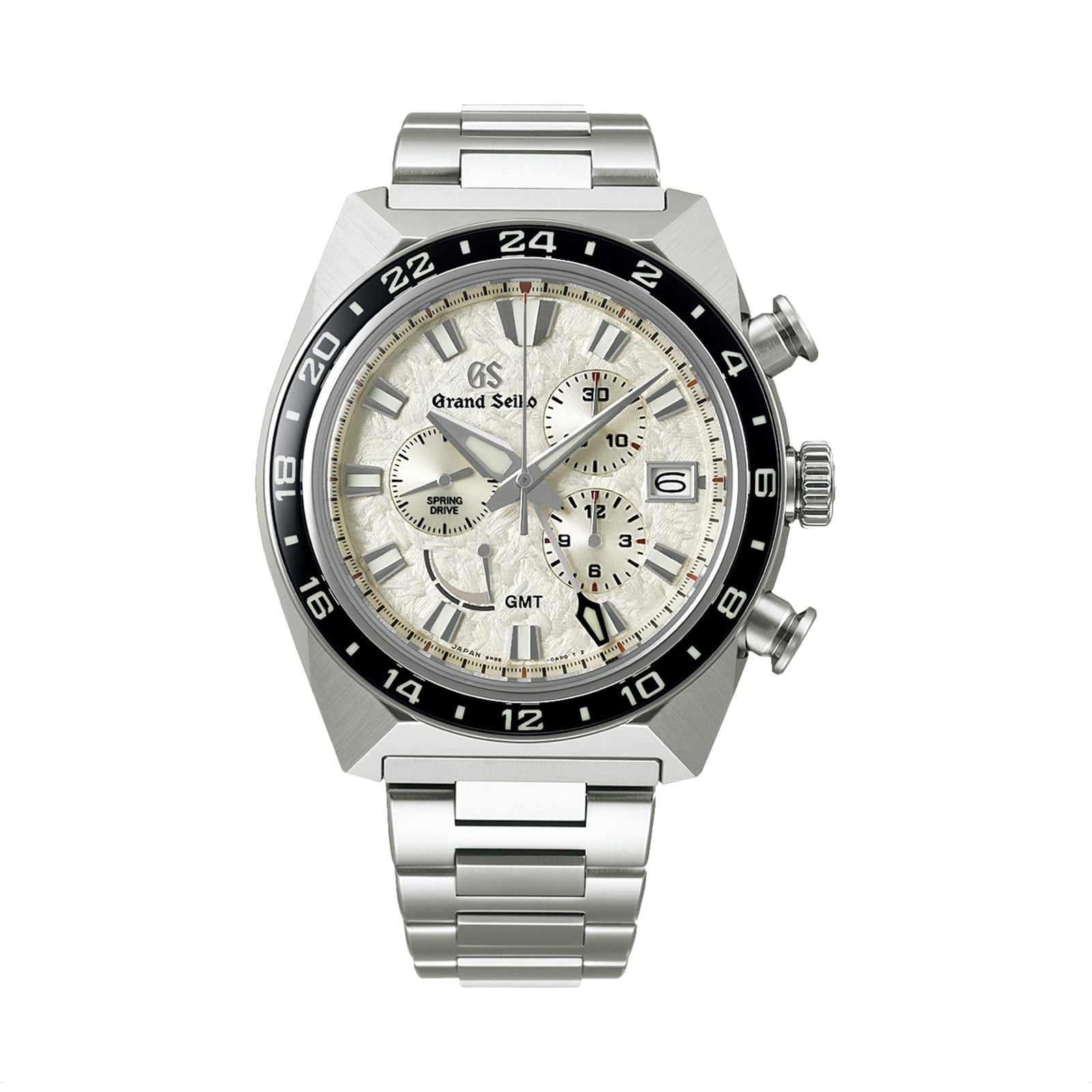 The Grand Seiko Spring Drive Chronograph Sport features a stainless steel case, silver dial, black bezel, Caliber 9R86 movement, chronograph subdials, date window at 3 o’clock, and a metal bracelet.