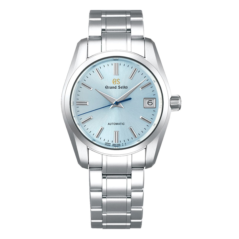 The Grand Seiko Automatic Heritage—an elegant silver wristwatch with a light blue dial, date at 3 o’clock, and metal bracelet—is ideal for celebrating the 25th anniversary limited edition.