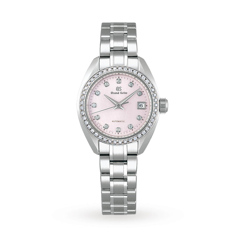 The Grand Seiko Ladies Automatic Elegance features a silver case, pink dial with diamond hour markers, and a metal bracelet.