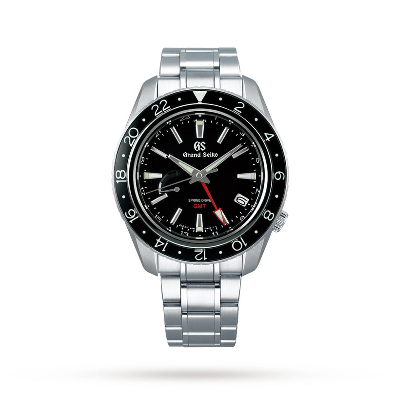 The Grand Seiko Spring Drive GMT Sport wristwatch features a black dial, silver band, and red GMT hand, displayed on a white background.
