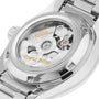 Close-up of a Grand Seiko Hi-Beat GMT Heritage case back showcasing the 9S86 automatic movement and engraved gold logo through its transparent display.