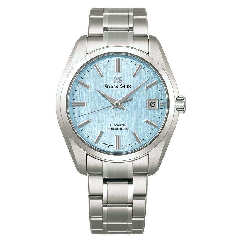 The Grand Seiko Hi-Beat Heritage features a light blue textured dial, silver markers, a date window, and a stainless steel bracelet.