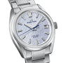 The Grand Seiko Hi-Beat 80 Hours Evolution 9 features a stainless steel case, textured silver dial inspired by mountains, blue second hand, date at 3 o’clock, and “Hi-Beat 36000 80 Hours”—celebrating Grand Seiko’s 65th Anniversary.