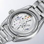 Close-up of Grand Seikos Spring Drive U.F.A Evolution 9 transparent case back, revealing the intricate mechanical movement within.