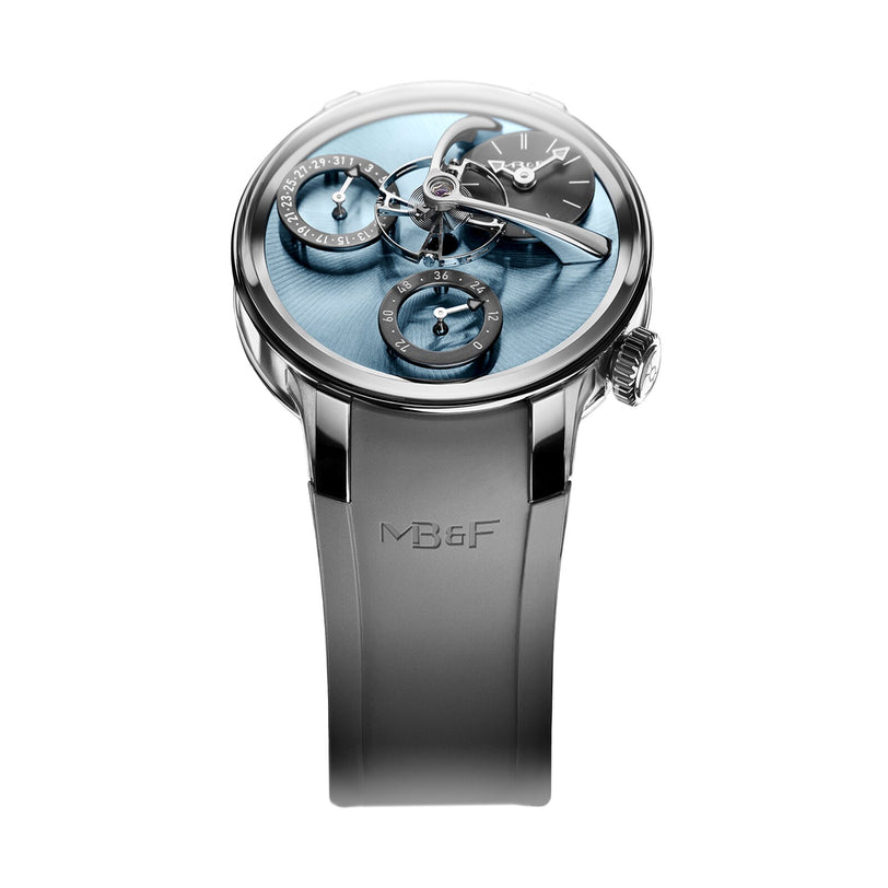 The MB&F Legacy Machine Split Escapement EVO is a luxury wristwatch featuring a light blue dial, multiple subdials, and a gray rubber strap branded with “MB&F.”.