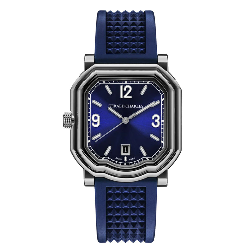 The Gerald Charles Maestro GC Sport features a blue dial with bold numerals at 12 and 3, a date window at 6, and a blue textured vulcanized rubber strap.