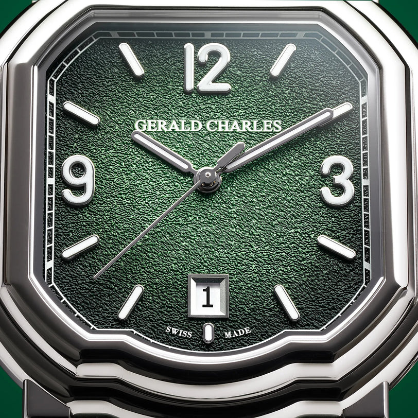 Close-up of the Gerald Charles Maestro GC Sport watch face in green, showcasing silver hands and markers with a date window at 6 o’clock.