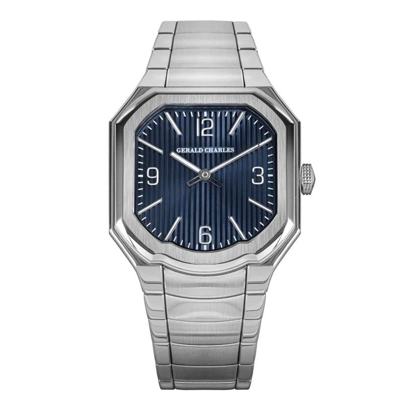 The Gerald Charles Masterlink Blue is a luxury wristwatch featuring a blue textured dial, silver hour markers, and a metal bracelet strap.
