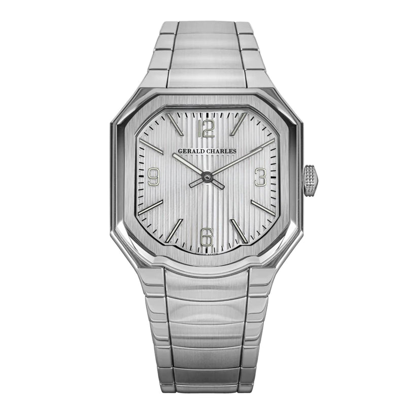 The Gerald Charles Masterlink Silver wristwatch features a rectangular face with Roman numerals and a metal link bracelet.